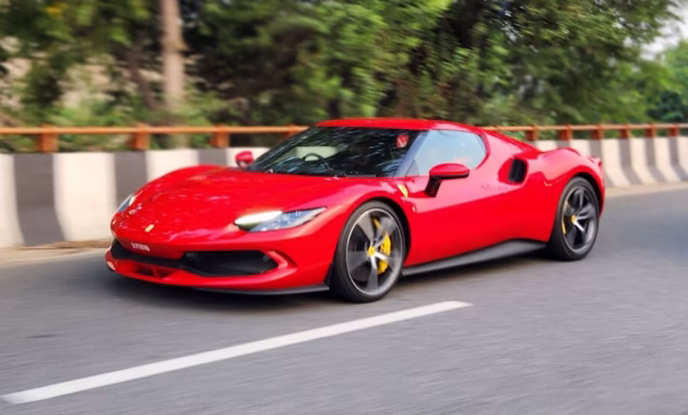 Red ferrari supercar in ways